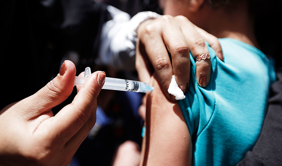 A Yemeni child receives a diphtheria vaccine at a health centre in the capital Sanaa, in this file photo taken on March 14, 2018. (AFP)