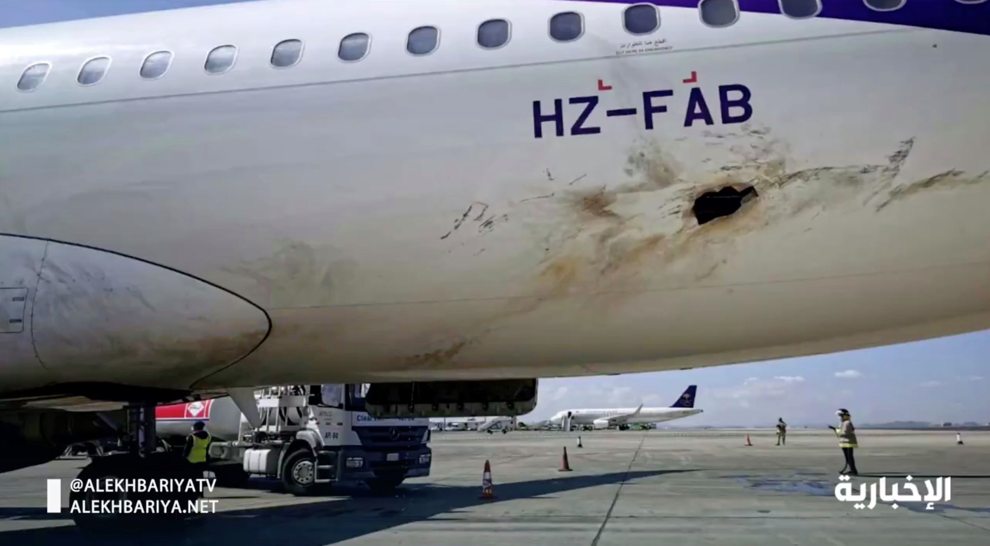 Saudi state television shows an airplane damaged in the attack by Yemen's Houthi militants at Abha Airport. (AP)