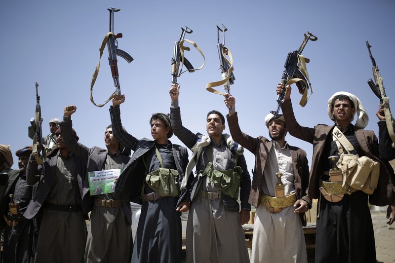 Houthi fighters hold their weapons as they chant slogans during a gathering showing support for the Houthi movement, in Sanaa, Yemen. (File/AP) Houthi fighters hold their weapons as they chant slogans during a gathering showing support for the Houthi movement, in Sanaa, Yemen. (File/AP)