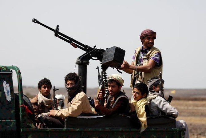 Houthi fighters ride on the back of a patrol truck as they secure the site of a pro-Houthi tribal gathering in a rural area near Sanaa, Yemen July 21, 2016. (Reuters)