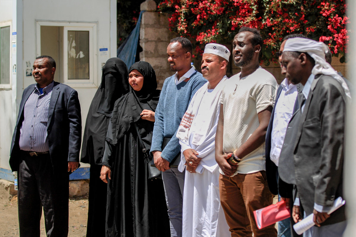 Representatives of African communities in Yemen gather to speak during a rally in Sanaa on March 13, 2021 following the previous weekend's fire in a holding facility. (AFP file photo)