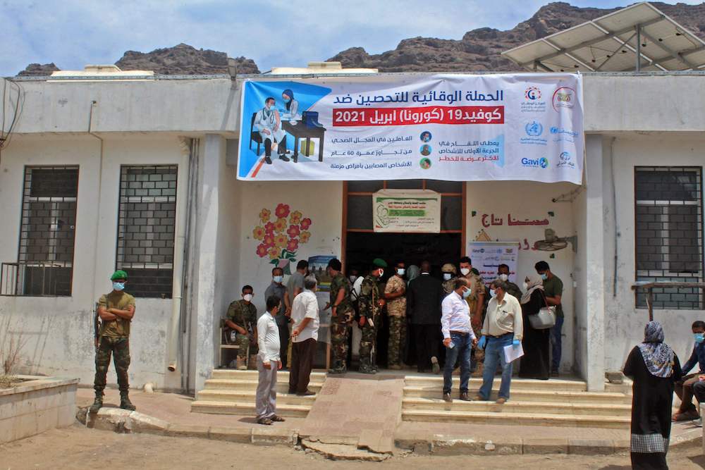 Yemenis gather outside a vaccination center in Al-Maala district of the southern city of Aden on April 20, 2021. (AFP) Yemenis gather outside a vaccination center in Al-Maala district of the southern city of Aden on April 20, 2021. (AFP)