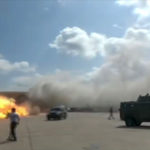 A video grab shows the moment a rocket hit Aden International Airport on Dec. 30, 2020, moments after the arrival of a plane carrying members of a new unity government. (AFPTV/AFP via Getty Images)