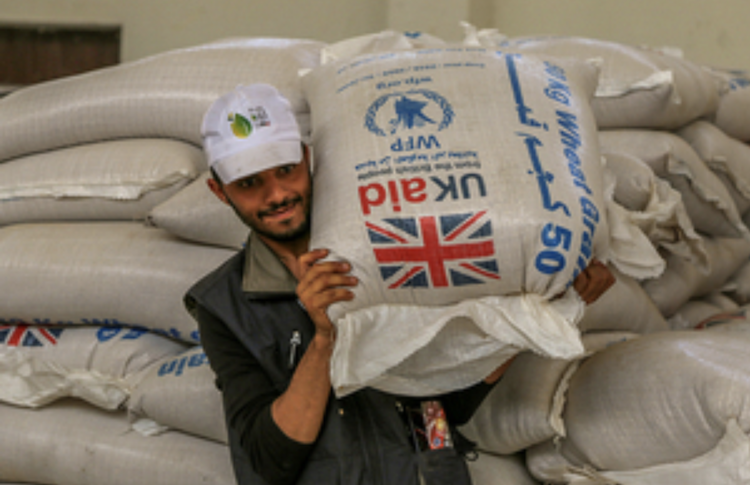 Distribution of UK-funded wheat grain by the World Food Programme in Yemen. (WFP/Ahmed Basha) Distribution of UK-funded wheat grain by the World Food Programme in Yemen. (WFP/Ahmed Basha)